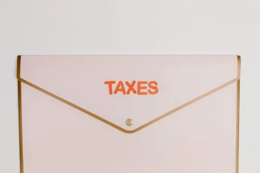 business document folder labeled corporate registry certificate, tax certificate and bank account opening, Korean startup paperwork, realistic photo