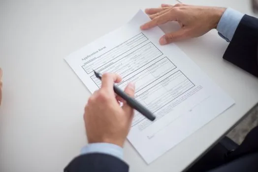 business owner checking application progress status