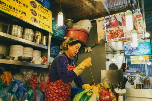 Korean business owner preparing tax certificate PDF on laptop