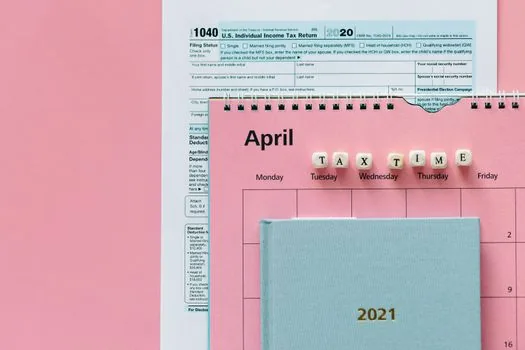 payroll tax deadline calendar on desk
