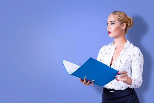 business owner comparing client invoice request with tax type notice and contract folder | 거래처 세금계산서 요청과 과세유형을 대조하는 장면