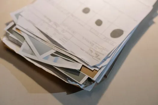 Korean commercial lease contract original, founder ID card, business registration memo, and tax office visit checklist on desk