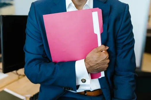 Korean startup paperwork folder with corporate seal certificate scan, verification number, bank and lease labels, realistic photo no readable personal data