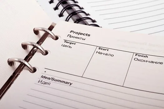 Restaurant owner filing hygiene education certificate with business license and calendar reminder, realistic small business paperwork scene | 위생교육 수료증과 영업신고 서류 보관 | 개업일과 보수교육 일정을 함께 관리하는 장면