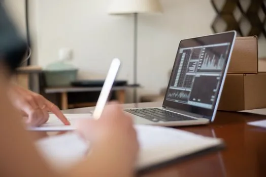 small business owner comparing public bid announcement eligibility, registration certificate, and checklist on laptop screen | 나라장터 승인 뒤 입찰공고 참가자격을 대조하는 장면