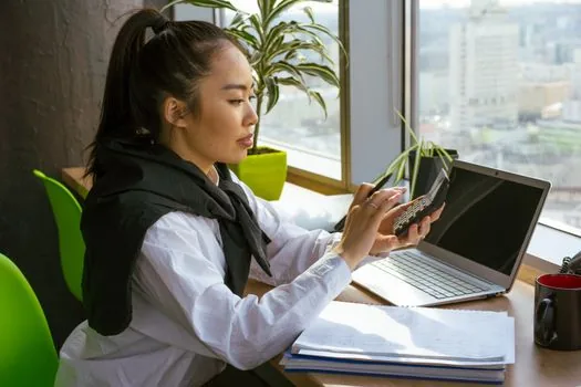 Korean small business owner comparing bankbook account number with business registration certificate and Hometax checklist