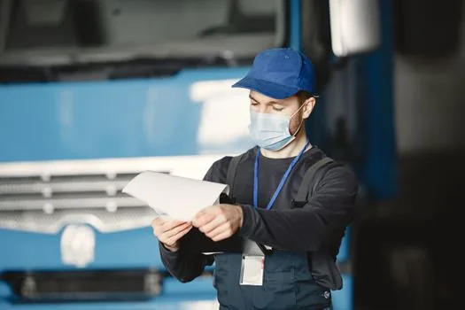 Korean workshop owner checking calendar for regular and occasional safety assessment, machinery checklist and tablet on desk, realistic editorial photo | 최초·수시·정기 평가 일정을 나누는 장면