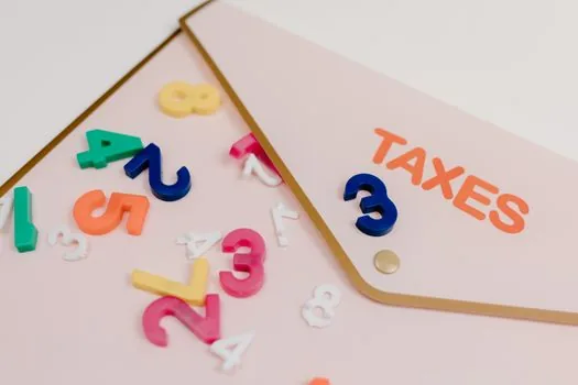 organized folders for payroll tax receipts and local income tax payment confirmation, Korean small office accounting scene, realistic photo